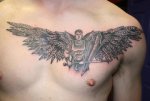 Black-And-Grey-Warrior-With-Wings-Tattoo-On-Man-Chest.jpg